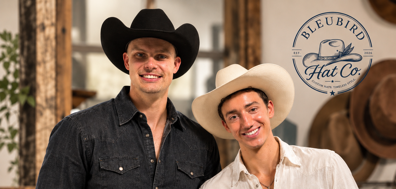 Two men wearing cowboy hats standing indoors, with a circular 'Bleubird Hat Co.' logo overlay in the top right.